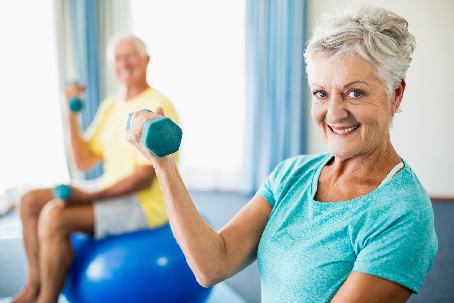 Seated exercises using hand-held weights